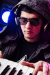 DJ mixing music at disco