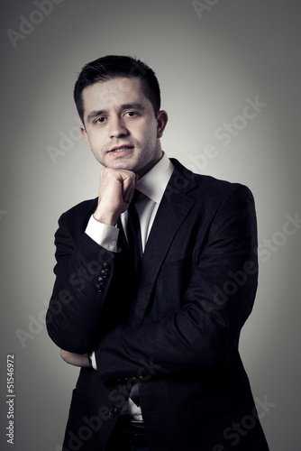 Photo: Young businessman thinking Young businessman thinking