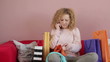 Video: Woman with shopping bags talking on mobile phone, tracking shot Woman with shopping bags talking on mobile phone, tracking shot