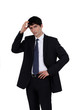 Confused businessman scratching head