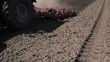 Tractor Preparing Field for Planting