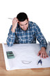 Draughtsman working on a new drawing