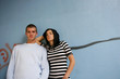 Photo: Teenagers in front of graffiti wall Teenagers in front of graffiti wall