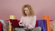 Young woman buying online with her credit card