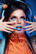 Nails Manicured. Make up. Close up of woman face with colorful m