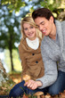 Couple picking mushrooms together