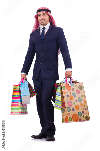 Photo: Arab man with shopping gifts on white Arab man with shopping gifts on white