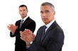 Businessmen rubbing their hands