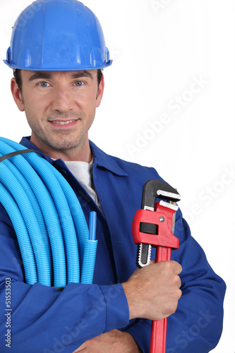 Photo: portrait of a plumber portrait of a plumber