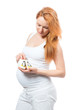 Pregnant woman hold small children's slippers