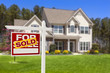 Photo: Sold Home For Sale Real Estate Sign and House Sold Home For Sale Real Estate Sign and House
