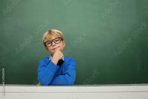 Photo: Schoolboy at the Blackboard Schoolboy at the Blackboard