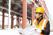 Construction worker under new building
