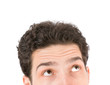 Foto: Young man looking up at copy space Young man looking up at copy space