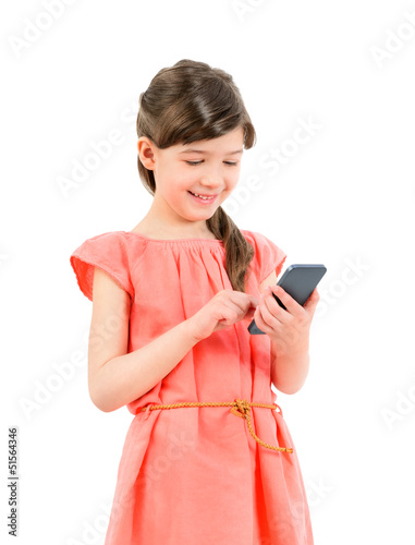 Photo: Smiling girl with mobile phone Smiling girl with mobile phone