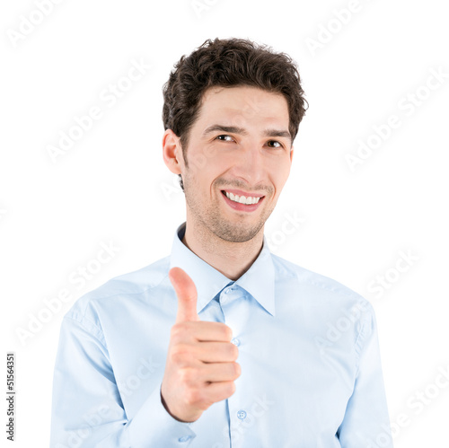 Photo: Handsome young man giving a thumb up Handsome young man giving a thumb up