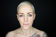 beautiful woman with short hair and tattoos