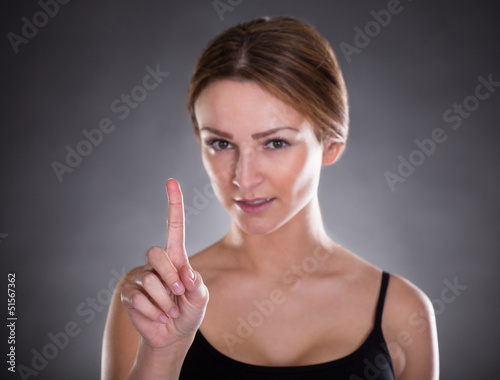 Photo: Fitness Woman Touching Screen Fitness Woman Touching Screen