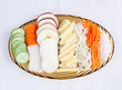 Photo: Sliced vegetables display on glass dish Sliced vegetables display on glass dish