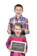 children holding slate