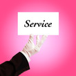 Photo : butler holding service card butler holding service card