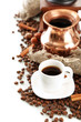 Cup and pot of coffee and coffee beans, isolated on white