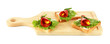 Salami rolls with paprika pieces inside,