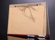 Beautiful old notebook on grey background