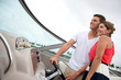 Couple driving a boat