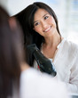 Woman blow drying her hair