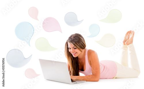 Photo: Woman chatting on a laptop Woman chatting on a laptop