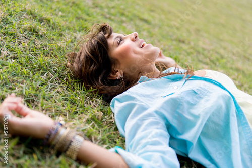 Photo: Thoughtful woman outdoors Thoughtful woman outdoors