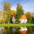 house at the lake bank in autumn. Sigulda, Latvia