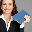 Businesswoman with notepad or organizer