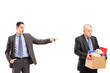Angry boss firing an employee