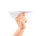 Photo: Male hand holding a paper airplane Male hand holding a paper airplane