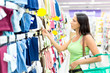 woman buys in the shop towel