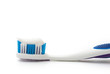 toothbrush with toothpaste on white with clipping path