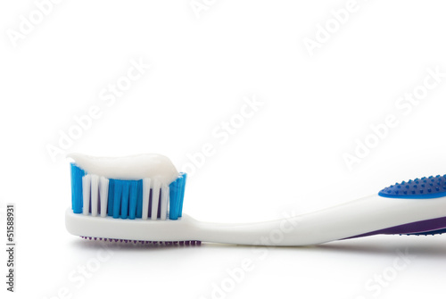 Photo: toothbrush with toothpaste on white with clipping path toothbrush with toothpaste on white with clipping path