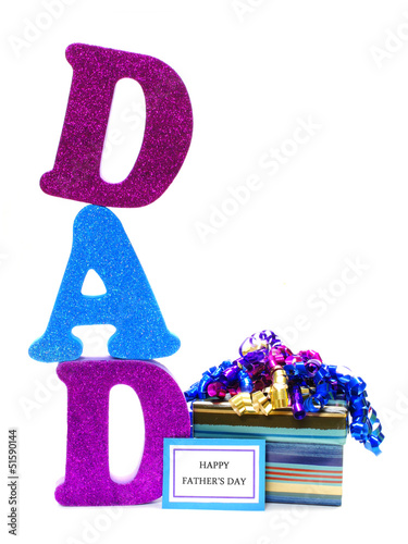 Photo: DAD letters with gift box and Happy Fathers Day tag DAD letters with gift box and Happy Fathers Day tag