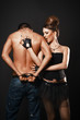 Couple in love. Happy loving couple. Dark background.