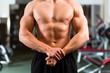 Bodybuilder posing in Gym