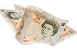 Ten pounds notes on white