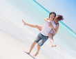 Man Giving a Piggyback Ride to His Girlfriend