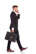 Photo: business man walks away business man walks away