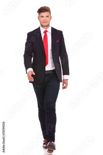 Photo: business man walking business man walking