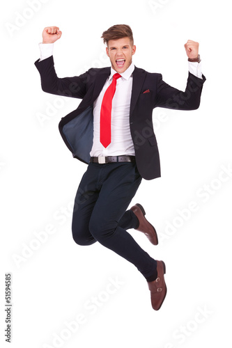 Photo: business man jumping ecstatic business man jumping ecstatic