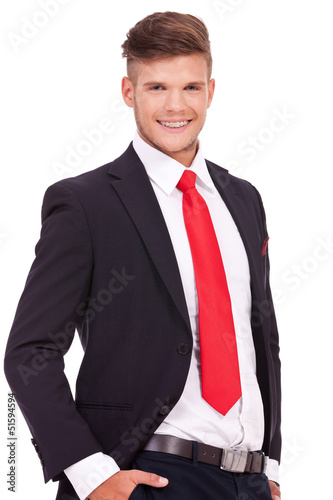 Photo: business man with hands in pockets business man with hands in pockets