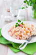 Pasta in cream sauce with crawfish, selective focus