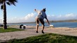 Man balancing and jumping, slackline